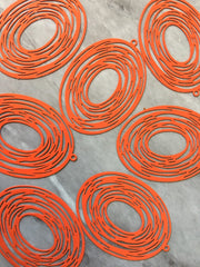 Orange Filigree Cyclone Tornado Oval Beads, circle cutout metal 41mm Earring or Necklace pendant bead, one hole top jewelry reddish orange