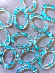 Oval clear resin teal confetti glitter 1 Hole Laser Cut Cutouts, boho earrings Tassel Necklace Jewelry pendant acrylic blanks turquoise blue